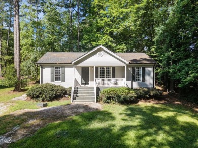Discover your dream ranch home in this inviting lake community on River Golf and County Club at Lake Royale in North Carolina - for sale on GolfHomes.com, golf home, golf lot