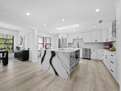 Located in the quiet, gated community of Bay Isles on Longboat on Longboat Key Golf Club Resort in Florida - for sale on GolfHomes.com, golf home, golf lot