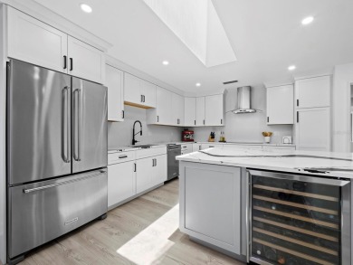 Located in the quiet, gated community of Bay Isles on Longboat on Longboat Key Golf Club Resort in Florida - for sale on GolfHomes.com, golf home, golf lot
