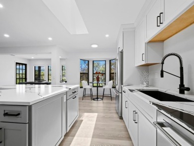 Located in the quiet, gated community of Bay Isles on Longboat on Longboat Key Golf Club Resort in Florida - for sale on GolfHomes.com, golf home, golf lot