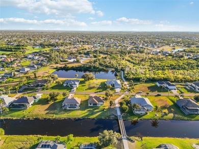 Perfectly positioned on a scenic waterway, this 2017 CUSTOM on Rotonda Golf and Country Club - Long Marsh  in Florida - for sale on GolfHomes.com, golf home, golf lot