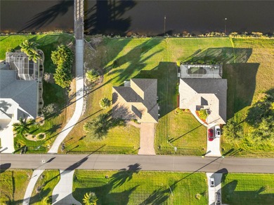 Perfectly positioned on a scenic waterway, this 2017 CUSTOM on Rotonda Golf and Country Club - Long Marsh  in Florida - for sale on GolfHomes.com, golf home, golf lot