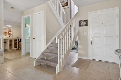 Resort style living at PGA National in well maintained on PGA National Golf Club in Florida - for sale on GolfHomes.com, golf home, golf lot