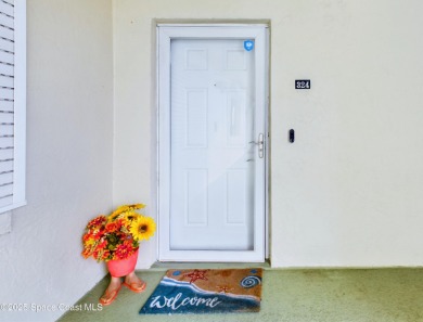 3rd FLOOR CORNER UNIT WITH 2 BALCONIES AN 2 DEEDED PARKING on Manatee Cove Golf Course in Florida - for sale on GolfHomes.com, golf home, golf lot