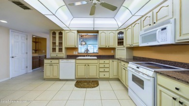 3rd FLOOR CORNER UNIT WITH 2 BALCONIES AN 2 DEEDED PARKING on Manatee Cove Golf Course in Florida - for sale on GolfHomes.com, golf home, golf lot