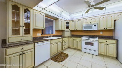 3rd FLOOR CORNER UNIT WITH 2 BALCONIES AN 2 DEEDED PARKING on Manatee Cove Golf Course in Florida - for sale on GolfHomes.com, golf home, golf lot