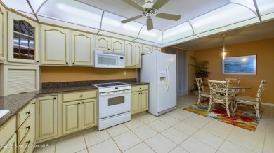 3rd FLOOR CORNER UNIT WITH 2 BALCONIES AN 2 DEEDED PARKING on Manatee Cove Golf Course in Florida - for sale on GolfHomes.com, golf home, golf lot