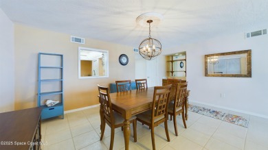 3rd FLOOR CORNER UNIT WITH 2 BALCONIES AN 2 DEEDED PARKING on Manatee Cove Golf Course in Florida - for sale on GolfHomes.com, golf home, golf lot
