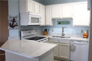 An opportunity to own a fully furnished, water view condo in a on Padre Isles Golf Course in Texas - for sale on GolfHomes.com, golf home, golf lot