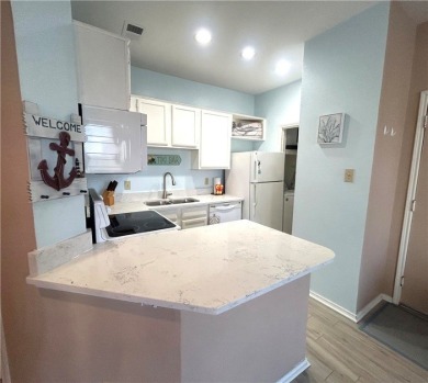 An opportunity to own a fully furnished, water view condo in a on Padre Isles Golf Course in Texas - for sale on GolfHomes.com, golf home, golf lot