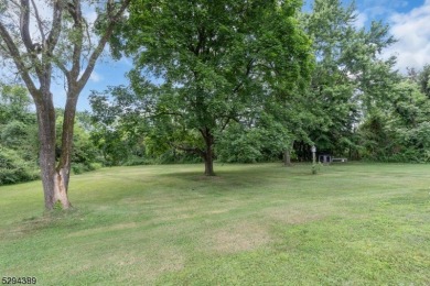 Cyclist will love rolling right out of your driveway and into on Neshanic Valley Golf Course  in New Jersey - for sale on GolfHomes.com, golf home, golf lot