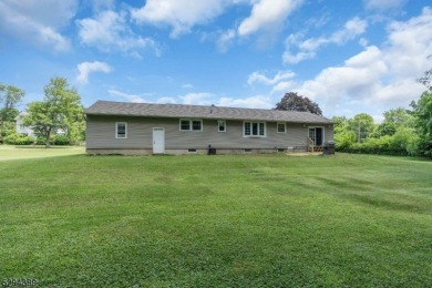 Cyclist will love rolling right out of your driveway and into on Neshanic Valley Golf Course  in New Jersey - for sale on GolfHomes.com, golf home, golf lot