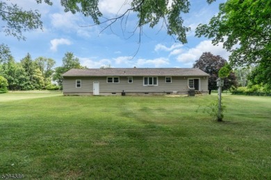 Cyclist will love rolling right out of your driveway and into on Neshanic Valley Golf Course  in New Jersey - for sale on GolfHomes.com, golf home, golf lot