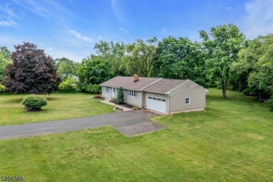 Cyclist will love rolling right out of your driveway and into on Neshanic Valley Golf Course  in New Jersey - for sale on GolfHomes.com, golf home, golf lot