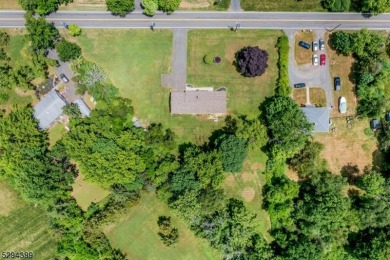 Cyclist will love rolling right out of your driveway and into on Neshanic Valley Golf Course  in New Jersey - for sale on GolfHomes.com, golf home, golf lot