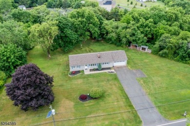 Cyclist will love rolling right out of your driveway and into on Neshanic Valley Golf Course  in New Jersey - for sale on GolfHomes.com, golf home, golf lot