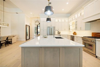 THIS HOME HAS IT ALL! New roof, flood barriers, hurricane impact on West Bay Beach and Golf Club in Florida - for sale on GolfHomes.com, golf home, golf lot