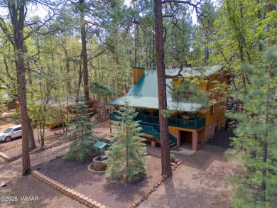 Tucked beneath towering pines in the heart of Pinetop Country on Pinetop Lakes Golf and Country Club in Arizona - for sale on GolfHomes.com, golf home, golf lot
