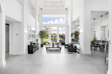 This meticulously maintained home, set on a rare, breathtaking on Boca West Golf and Country Club in Florida - for sale on GolfHomes.com, golf home, golf lot