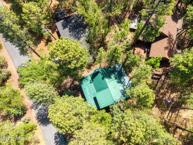 Tucked beneath towering pines in the heart of Pinetop Country on Pinetop Lakes Golf and Country Club in Arizona - for sale on GolfHomes.com, golf home, golf lot
