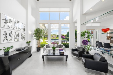 This meticulously maintained home, set on a rare, breathtaking on Woodfield Country Club in Florida - for sale on GolfHomes.com, golf home, golf lot