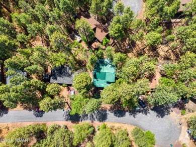 Tucked beneath towering pines in the heart of Pinetop Country on Pinetop Lakes Golf and Country Club in Arizona - for sale on GolfHomes.com, golf home, golf lot
