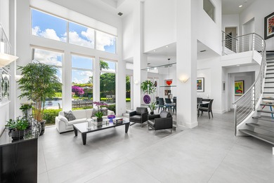 This meticulously maintained home, set on a rare, breathtaking on Woodfield Country Club in Florida - for sale on GolfHomes.com, golf home, golf lot