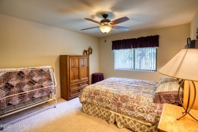 Tucked beneath towering pines in the heart of Pinetop Country on Pinetop Lakes Golf and Country Club in Arizona - for sale on GolfHomes.com, golf home, golf lot