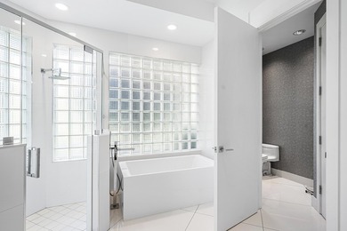 This meticulously maintained home, set on a rare, breathtaking on Boca West Golf and Country Club in Florida - for sale on GolfHomes.com, golf home, golf lot