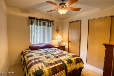 Tucked beneath towering pines in the heart of Pinetop Country on Pinetop Lakes Golf and Country Club in Arizona - for sale on GolfHomes.com, golf home, golf lot