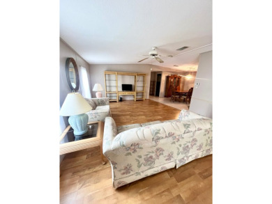 Looking for a well-maintained home in a vibrant gated golf on Pine Lakes Country Club in Florida - for sale on GolfHomes.com, golf home, golf lot