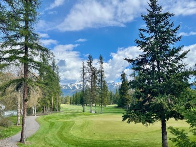 An elevated building lot on the west side of town overlooking on Whitefish Lake Golf Club in Montana - for sale on GolfHomes.com, golf home, golf lot