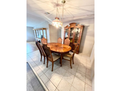 Looking for a well-maintained home in a vibrant gated golf on Pine Lakes Country Club in Florida - for sale on GolfHomes.com, golf home, golf lot