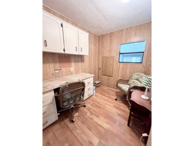 Looking for a well-maintained home in a vibrant gated golf on Pine Lakes Country Club in Florida - for sale on GolfHomes.com, golf home, golf lot