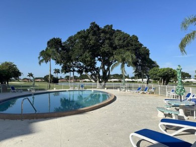 Beautiful 1st floor golf course condo in the City of Atlantis on Atlantis Golf Club in Florida - for sale on GolfHomes.com, golf home, golf lot