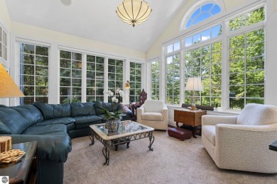 Perfectly positioned for the best of Northern Michigan living on Leland Country Club in Michigan - for sale on GolfHomes.com, golf home, golf lot