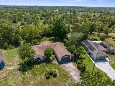 Under contract-accepting backup offers. INVESTOR SPECIAL. Great on Spring Hill Golf Course in Florida - for sale on GolfHomes.com, golf home, golf lot