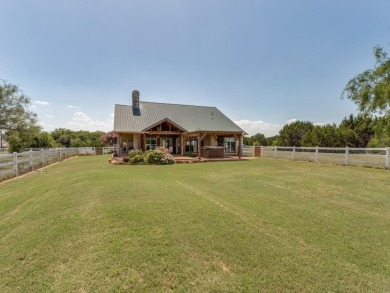 Located in White Bluff Resorts at Lake Whitney, this ranch-style on White Bluff Resort - Old Course in Texas - for sale on GolfHomes.com, golf home, golf lot