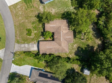 Under contract-accepting backup offers. INVESTOR SPECIAL. Great on Spring Hill Golf Course in Florida - for sale on GolfHomes.com, golf home, golf lot