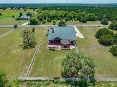 Located in White Bluff Resorts at Lake Whitney, this ranch-style on White Bluff Resort - Old Course in Texas - for sale on GolfHomes.com, golf home, golf lot