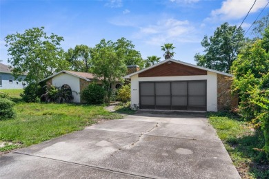Under contract-accepting backup offers. INVESTOR SPECIAL. Great on Spring Hill Golf Course in Florida - for sale on GolfHomes.com, golf home, golf lot