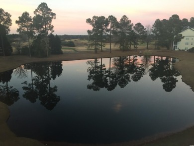 Enjoy the incredible view of the pond and golf course from this on Man O War Golf Links in South Carolina - for sale on GolfHomes.com, golf home, golf lot