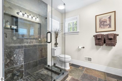 Perfectly positioned for the best of Northern Michigan living on Leland Country Club in Michigan - for sale on GolfHomes.com, golf home, golf lot