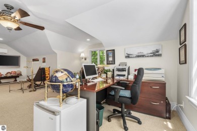 Perfectly positioned for the best of Northern Michigan living on Leland Country Club in Michigan - for sale on GolfHomes.com, golf home, golf lot