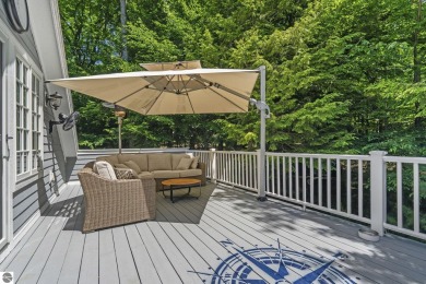 Perfectly positioned for the best of Northern Michigan living on Leland Country Club in Michigan - for sale on GolfHomes.com, golf home, golf lot