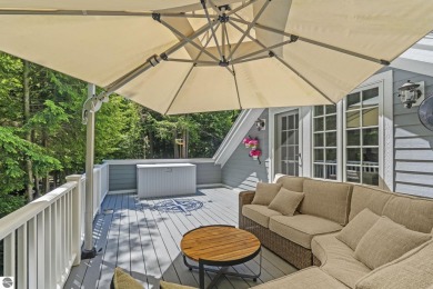 Perfectly positioned for the best of Northern Michigan living on Leland Country Club in Michigan - for sale on GolfHomes.com, golf home, golf lot