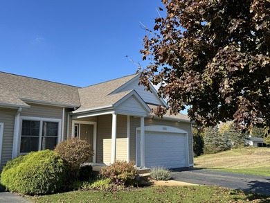 This home overlooks the pristine Lake Michigan Hills Golf Course on Lake Michigan Hills Golf Club in Michigan - for sale on GolfHomes.com, golf home, golf lot