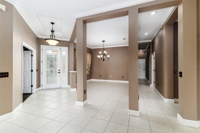 Welcome to this beautiful 3-bedroom, 2-bath lakefront home on Grasslands Golf and Country Club in Florida - for sale on GolfHomes.com, golf home, golf lot