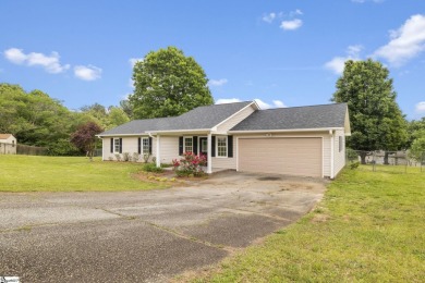 Welcome to this beautifully updated 3-bedroom, 2-bathroom home on River Falls Plantation in South Carolina - for sale on GolfHomes.com, golf home, golf lot