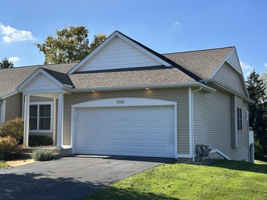 This home overlooks the pristine Lake Michigan Hills Golf Course on Lake Michigan Hills Golf Club in Michigan - for sale on GolfHomes.com, golf home, golf lot